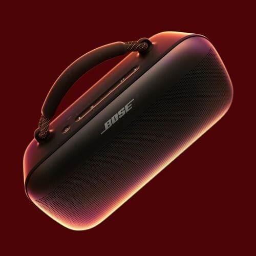 Portable Bluetooth speaker with handle on red background