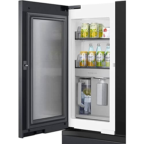 Open refrigerator door showing beverage storage with drinks.